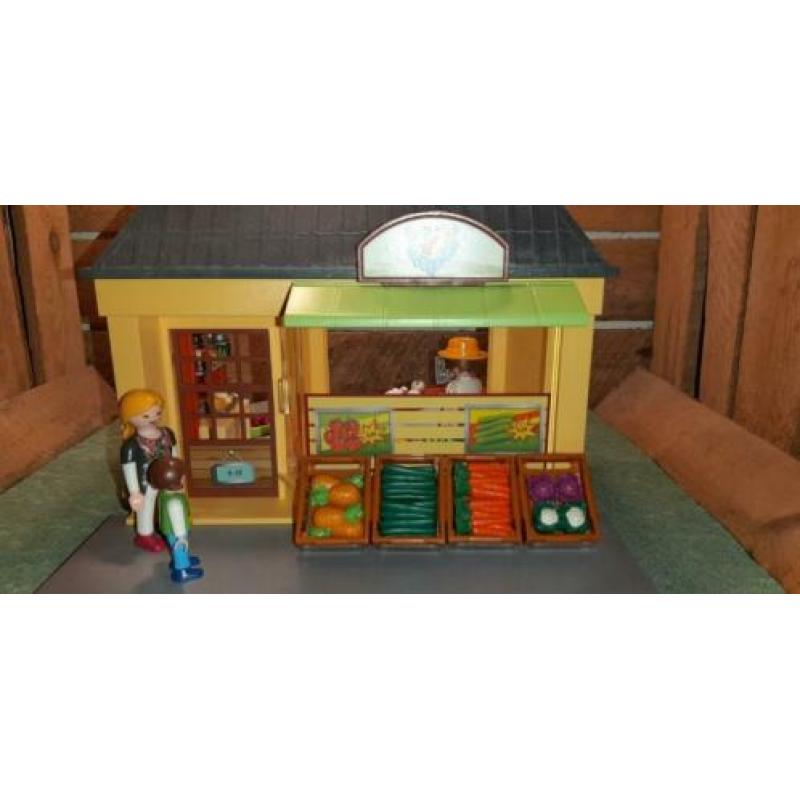 Playmobil de kruidenierswinkel met de 70375 gebouw.