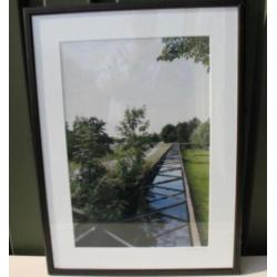 Sfeerrijke foto "landschap met afwateringskanaal". M. Koch.